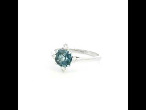 18K white gold London Blue Topaz ring featuring a 1.10 carat natural cushion-cut London Blue Topaz with 0.14 carat natural diamond accents.