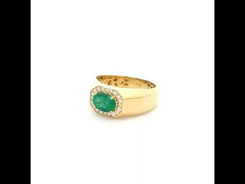 18K yellow gold men's signet ring featuring a 1.15 carat natural oval emerald surrounded by a halo of natural diamonds with a bold polished gold band.