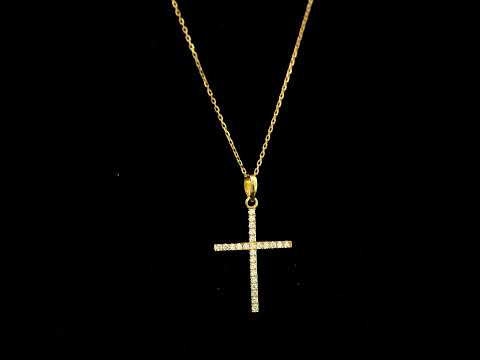 18K yellow gold diamond cross pendant featuring 0.26 carat natural round brilliant diamonds. Chain sold separately.