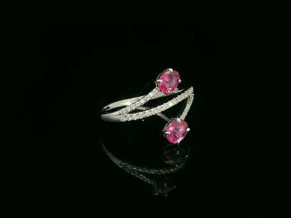 18K white gold ruby and diamond bypass ring with twin oval rubies by Emirates Diamonds