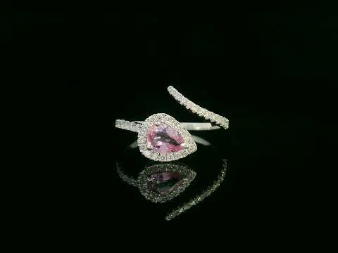 18K white gold pear-shaped pink sapphire and diamond bypass ring with halo design by Emirates Diamonds