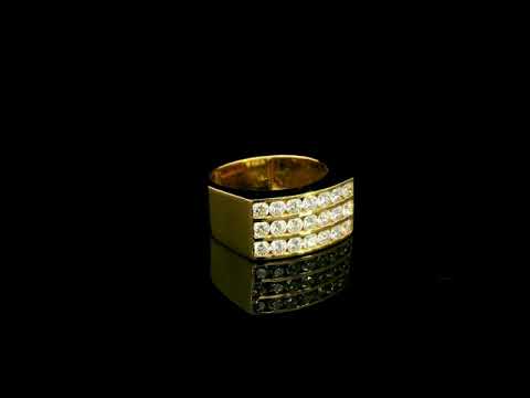 Men’s diamond statement ring in 18K yellow gold featuring three rows of round brilliant diamonds across a wide tapered gold band.