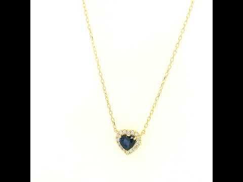 Heart-shaped blue sapphire and diamond halo pendant necklace in 18K yellow gold.