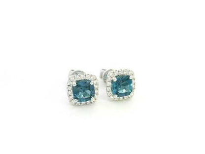 18K white gold blue topaz and diamond halo stud earrings by Emirates Diamonds