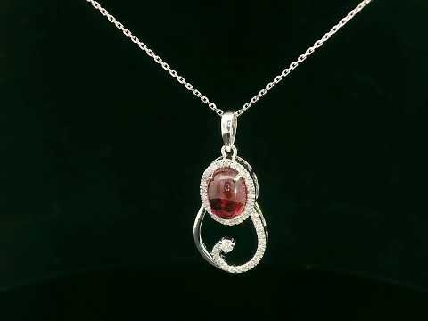18k white gold swirl pendant with 1.99ct cabochon ruby & 0.21ct diamonds – certificate included