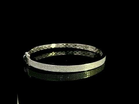 18K white gold multi-row diamond bangle set with 1.45 carats of natural round diamonds.