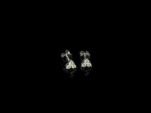 18K white gold diamond stud earrings featuring a delicate three-diamond design with a total diamond weight of 0.20 carat.