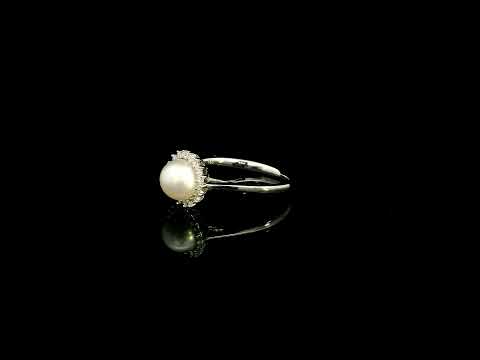 Freshwater pearl and diamond halo ring in 18K white gold with round white pearl and 0.15 carat natural diamonds