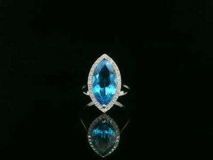 18K Gold Marquise Blue Topaz Ring with Diamond Halo – Luxury Statement Jewelry