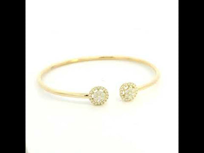 18K yellow gold open cuff bangle with two round natural diamond cluster ends.