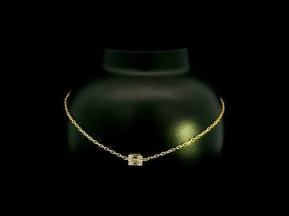 18K yellow gold bracelet with baguette and round natural diamonds in a geometric centre design on a fine adjustable chain