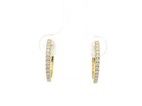 18K yellow gold diamond hoop earrings with slim minimalist design and natural diamonds