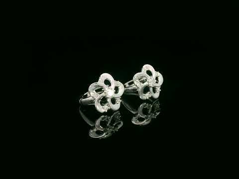 Diamond flower earrings with polished white gold finish
