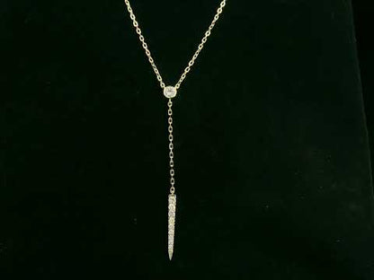 18K yellow gold diamond lariat necklace with bezel-set diamond and pavé drop – Emirates Diamonds.