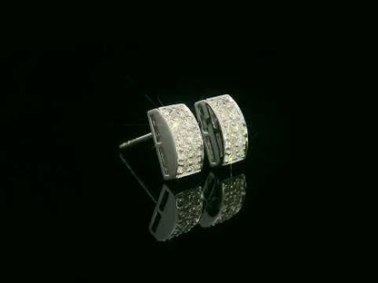 18K white gold pavé diamond bar stud earrings – minimalist curved design with 0.28ct diamonds by Emirates Diamonds.