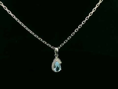 18k white gold pendant with 0.57ct pear aquamarine & 0.08ct diamond halo – certified authenticity included