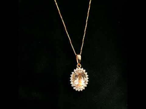 18K rose gold oval Morganite halo pendant featuring a 2.85 carat natural Morganite surrounded by natural diamonds.