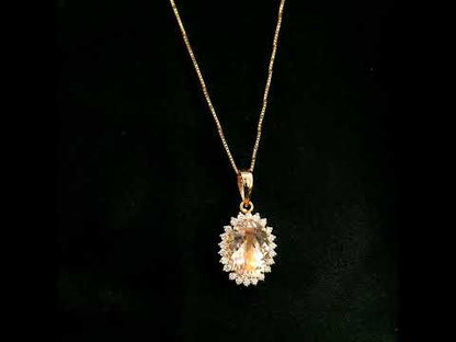 18K rose gold oval Morganite halo pendant featuring a 2.85 carat natural Morganite surrounded by natural diamonds.