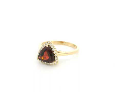 Trillion Cut Garnet and Diamond Halo Ring in 18K Yellow Gold by Emirates Diamonds