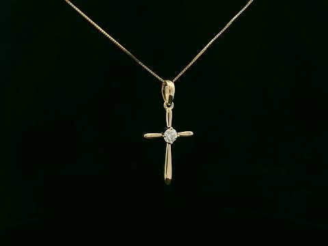 18K yellow gold diamond cross pendant necklace with minimalist design by Emirates Diamonds
