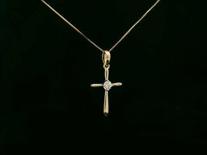 18K yellow gold diamond cross pendant necklace with minimalist design by Emirates Diamonds