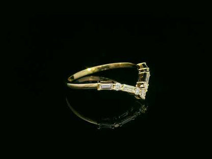 18K yellow gold diamond chevron ring with round and baguette diamonds – 0.27ct contour band by Emirates Diamonds.