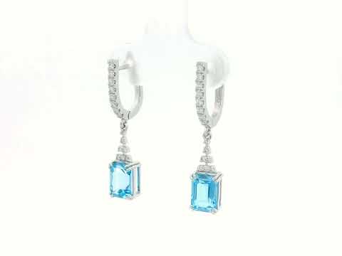 Emerald-cut Blue Topaz dangle earrings with diamond-studded huggie hoops in 18K white gold