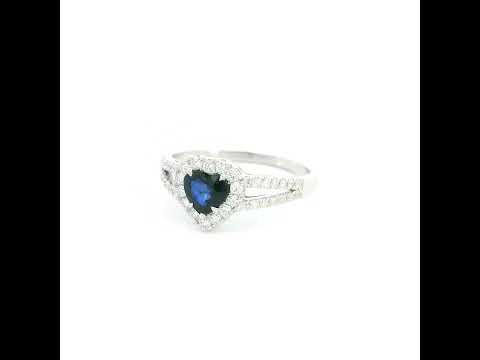 Heart shaped blue sapphire and diamond ring in 18K white gold with diamond split band