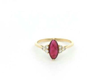 Natural 1.03 carat marquise ruby and diamond ring in solid 18K yellow gold with 0.21 carat natural diamond accents by Emirates Diamonds.