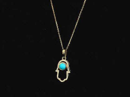 18K yellow gold turquoise hamsa pendant with diamond detail 0.34 carat