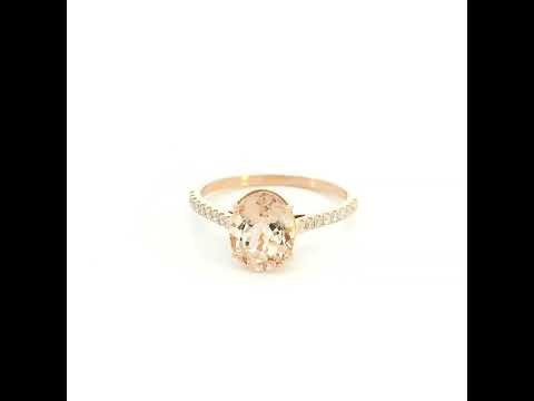 Oval morganite diamond ring handcrafted in 18K rose gold featuring a 1.84 carat natural oval morganite with 0.16 carat natural diamond pavé band.