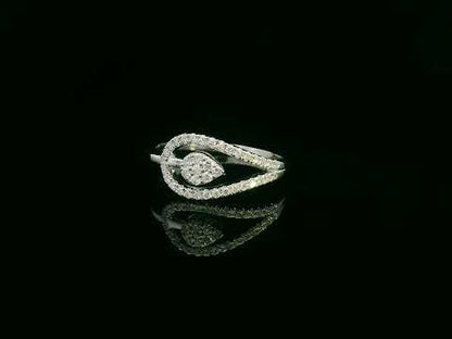 18K white gold diamond bypass ring featuring a teardrop-shaped diamond cluster and pavé set band by Emirates Diamonds