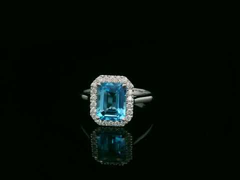 18K white gold Swiss blue topaz ring with diamond halo – emerald cut 2.35 carat topaz fine jewelry by Emirates Diamonds