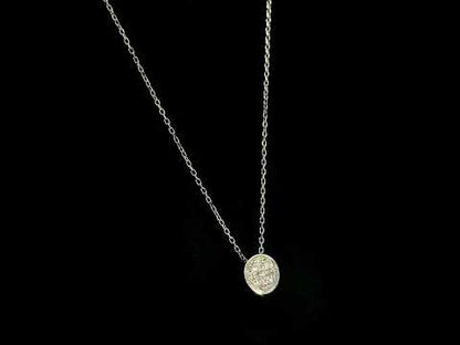 18K yellow gold diamond cross pendant set with 3.22 carats of princess cut diamonds and a diamond-set bail.