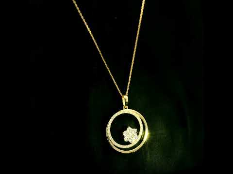 Diamond circle pendant in 18K yellow gold featuring an open circular design with a floral-inspired round diamond cluster and diamond-set curve.