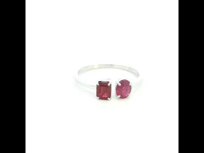 18K White Gold Natural Ruby Toi et Moi Ring featuring an oval and emerald-cut ruby in a modern open design.