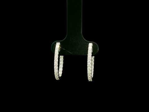 18K white gold inside out diamond hoop earrings with round brilliant diamonds set along the outer front and inner back surfaces.