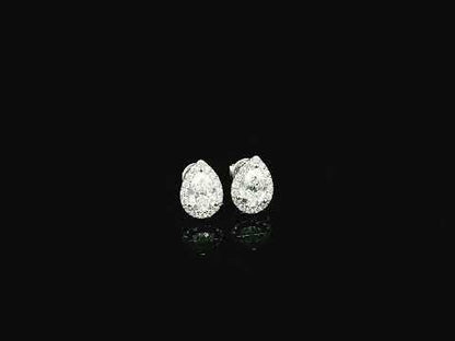 Pear cut diamond halo stud earrings in 18K white gold with GIA certified D color VS2 diamonds – Emirates Diamonds