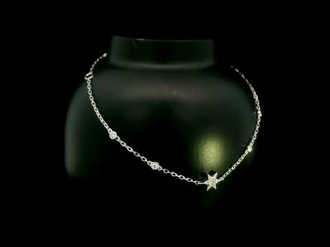 Diamond chain bracelet in 18K white gold featuring a pavé diamond star motif with bezel-set station diamonds totalling 0.16 carat.