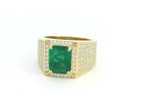 18K yellow gold men’s ring with 2.60 carat emerald center and 1.00 carat pavé diamonds