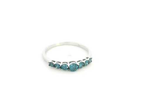 Shop a 0.50 carat blue diamond half eternity ring in 18K white gold. A bold, stackable luxury band by Emirates Diamonds.