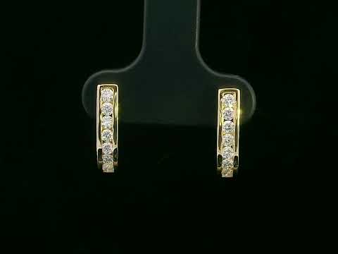 18K gold curved bar diamond earrings with 0.31ct round-cut diamonds, sleek modern design.