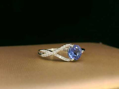 18K White Gold, Round Cut Tanzanite and Diamond Ring