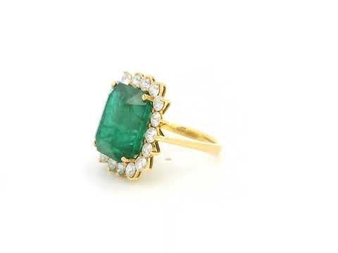 14.87 carat emerald and diamond halo statement ring in 18K yellow gold by Emirates Diamonds
