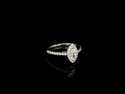 18K white gold marquise diamond halo engagement ring with diamond band featuring a 0.29 carat natural marquise cut centre diamond.