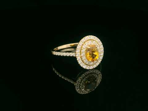 Oval yellow sapphire ring, 0.80 carat with 0.42 carat diamonds, 18K yellow gold, luxury statement ring by Emirates Diamonds