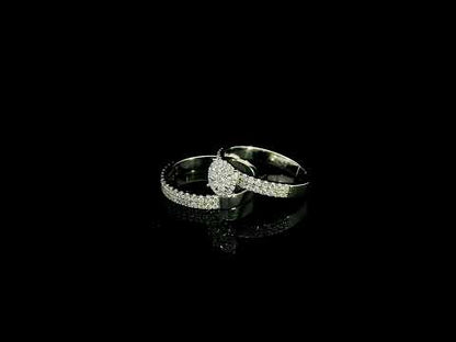 18K white gold diamond bridal set featuring a diamond cluster engagement ring and matching wedding band with 0.92 carat natural diamonds.