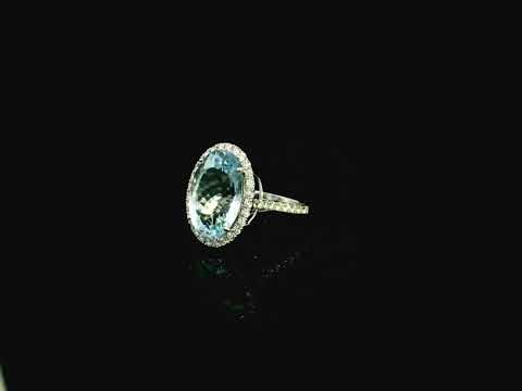 18K white gold aquamarine diamond halo ring 10.47 carat oval aquamarine with diamond halo – Emirates Diamonds