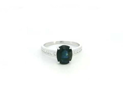 Oval blue sapphire ring 2.33 carat with diamond accents in 18K white gold by Emirates Diamonds