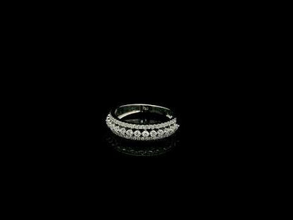 Natural three row diamond wedding band in solid 18K white gold featuring an elevated centre row of round brilliant diamonds with two pavé diamond rows, total diamond weight 0.62 carat.